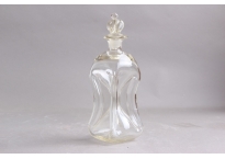 Cluck bottle with solid clear crown stopper