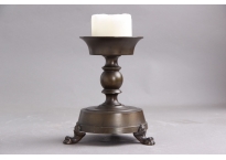 Candlestick on a strong base, on lion's feet
