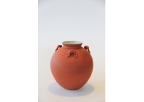 Red ceramic vase. 